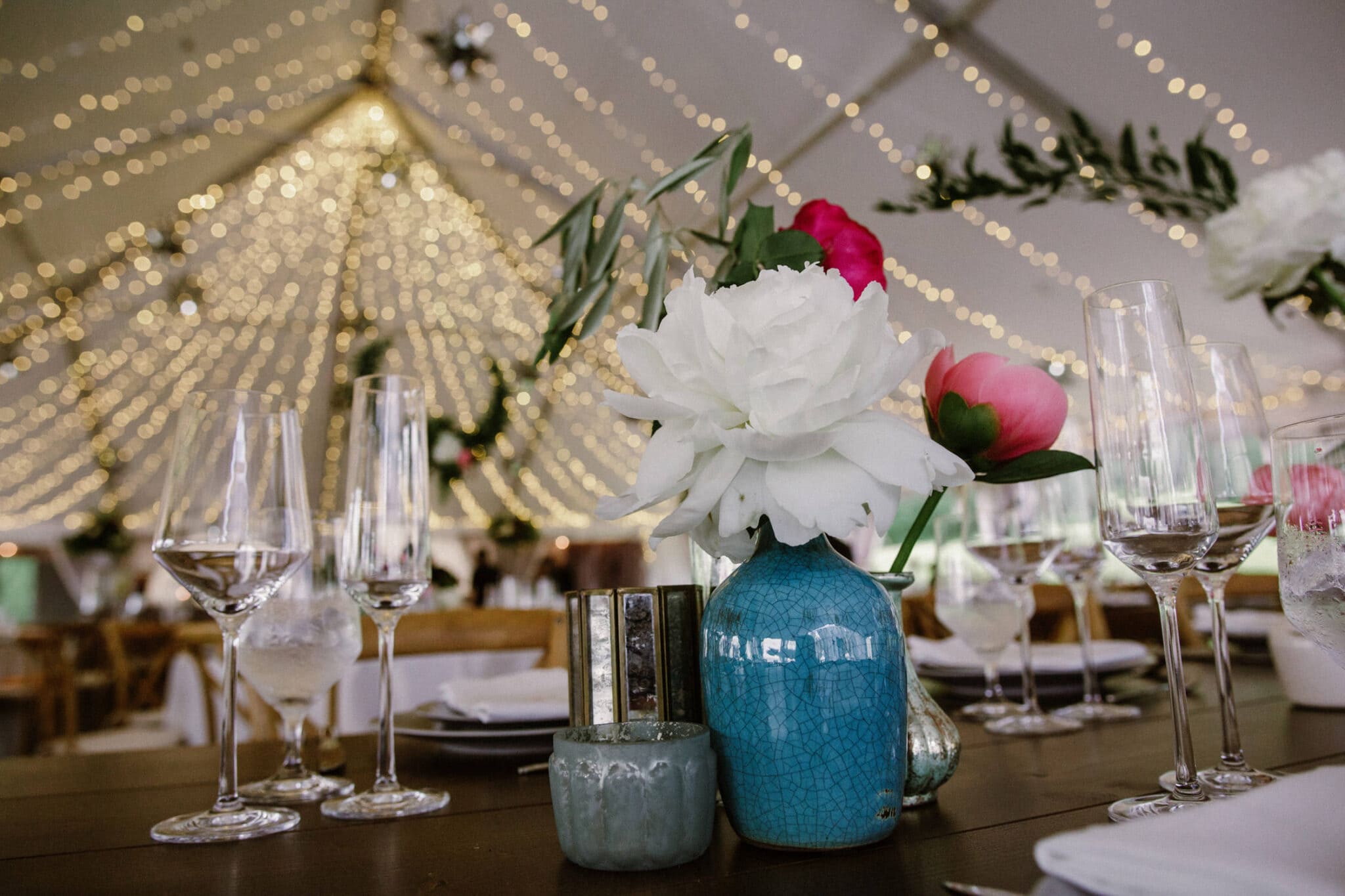 stunning blue floral vase with white roses