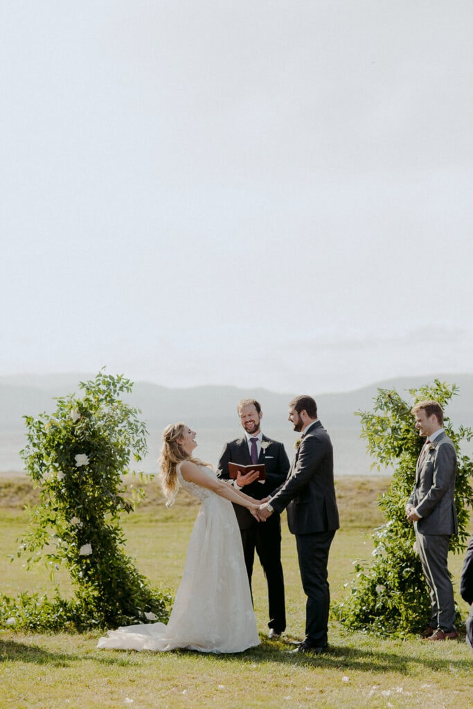 Jaclyn Watson Events • Modern Lakefront Wedding• asymmetrical green arbor